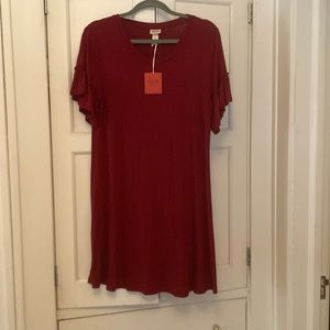 Dark red Medium Mossimo swing dress with ruffles sleeves.